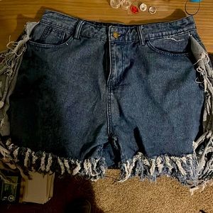 Shredded jean shorts